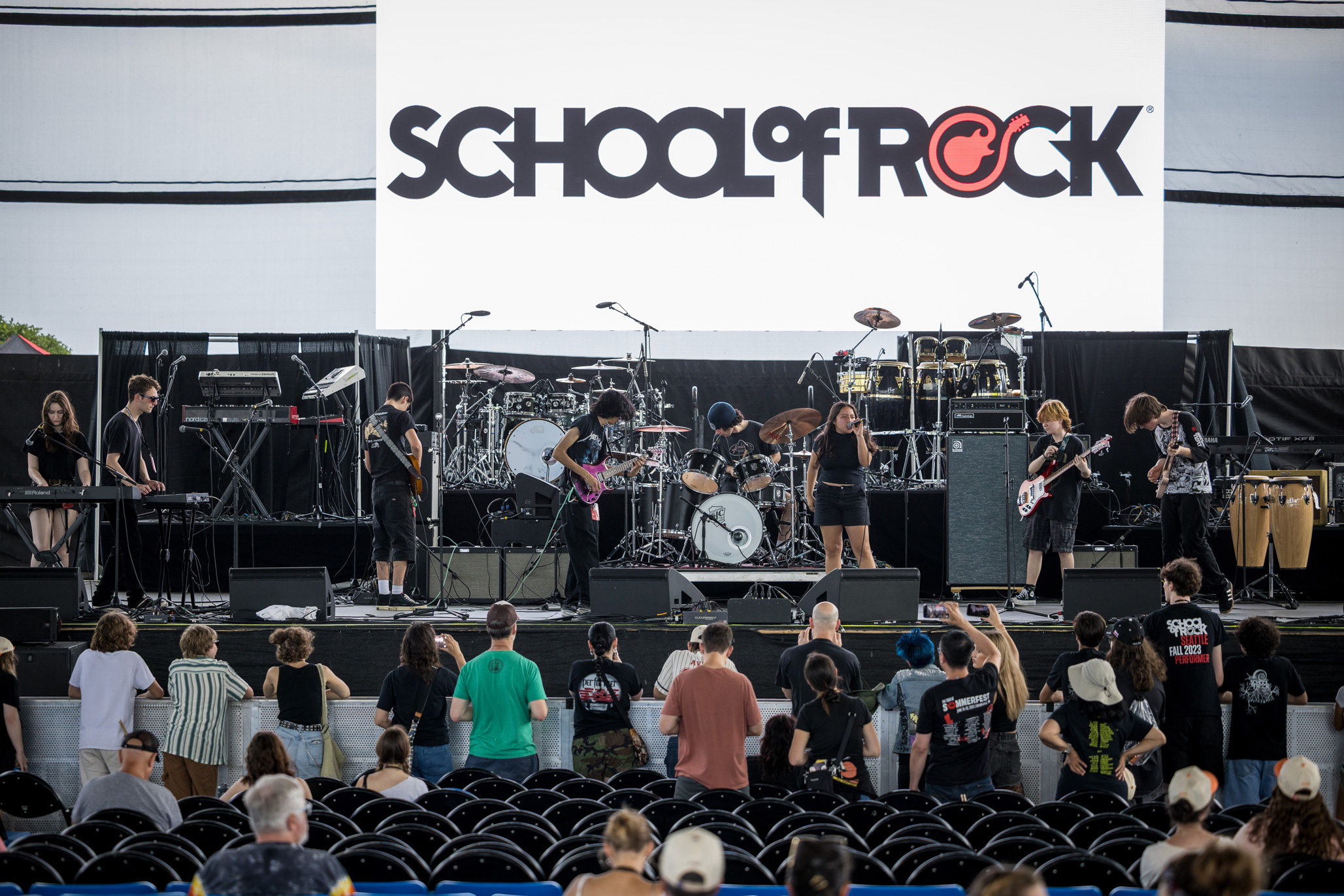 School of Rock Students Performing on Stage