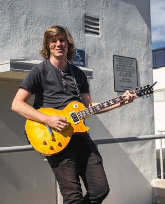 Music Director, Guitar Teacher, Bass Guitar Teacher Travis